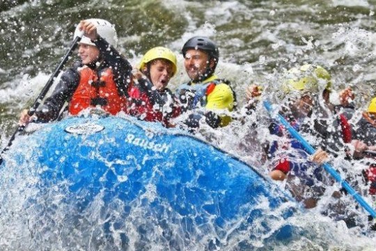 people whitewater rafting